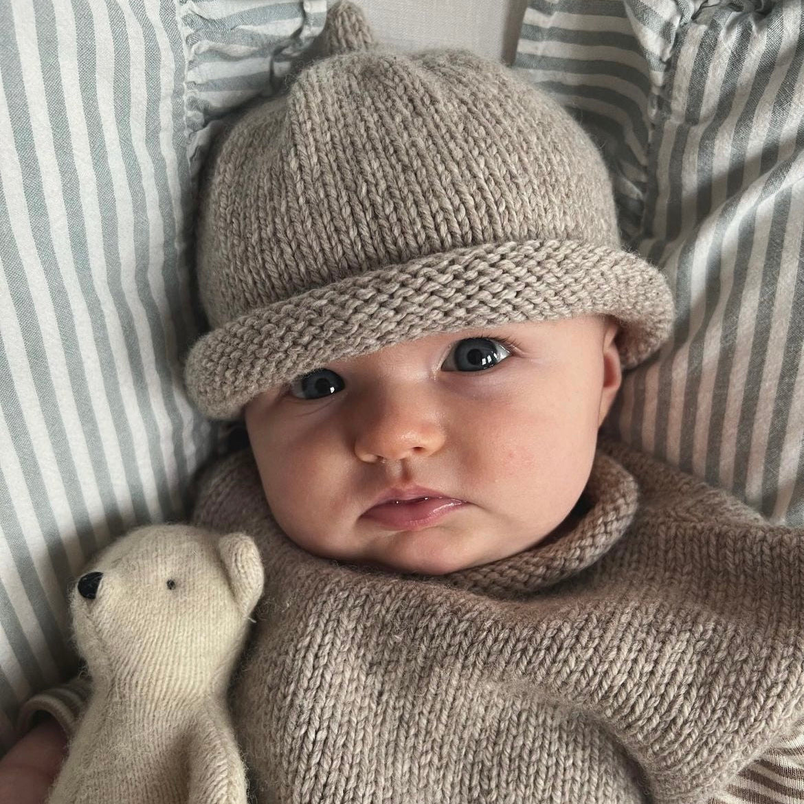 Baby girl wearing Oatmeal roll neck Vest and Beanie set
