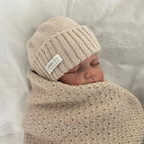 baby in sand newborn beanie