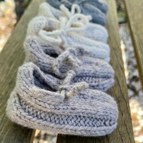 baby loafers on outside bench