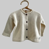 Ivory baby marley cardigan on hanger