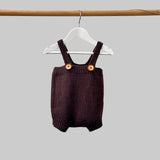 Baby romper in chocolate on hanger
