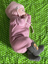 Baby Wearing Mushroom Chunky Knit Boots and Pink Hat