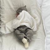 Baby wearing mushroom premature pants