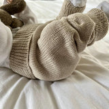 Baby wearing sand Jodhpurs from the marley set