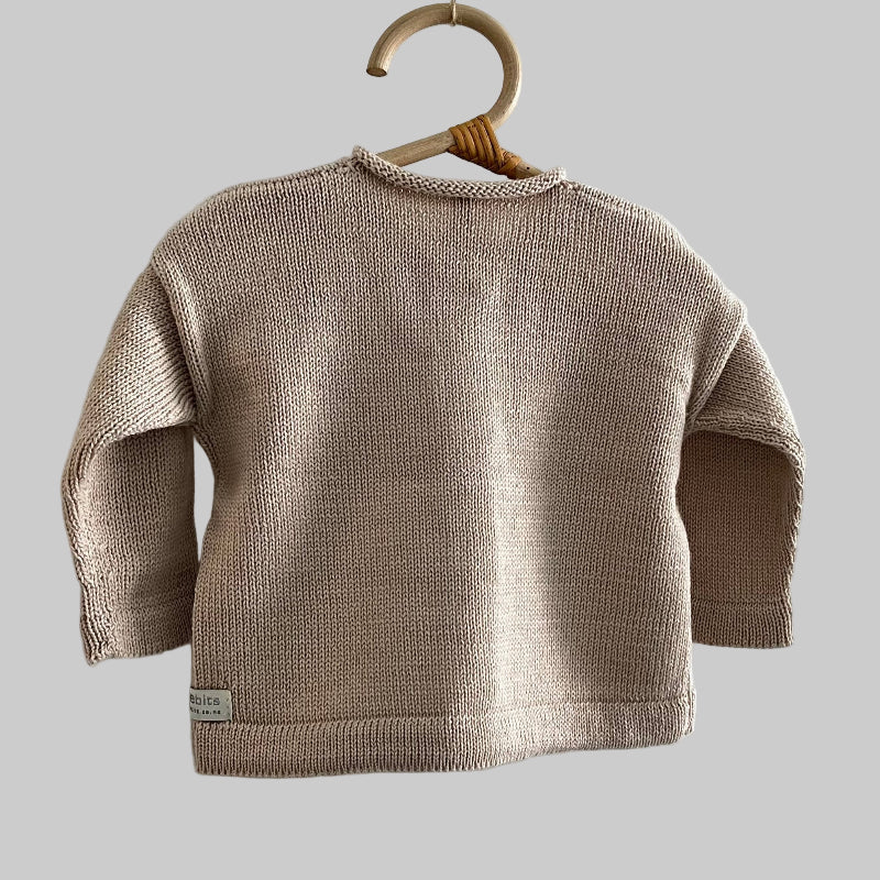 Back view of sand baby marley cardigan on hanger
