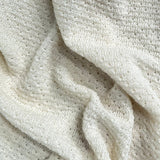 Close-up of a textured buttermilk baby wrap