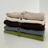 Colour range of the marley cardigan on a shelf