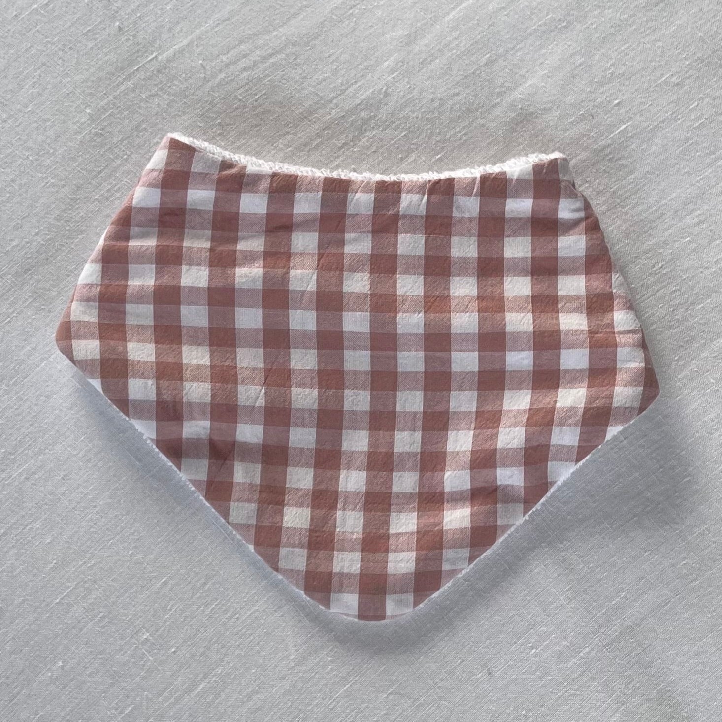 Gingham dribble bib pink and white squares