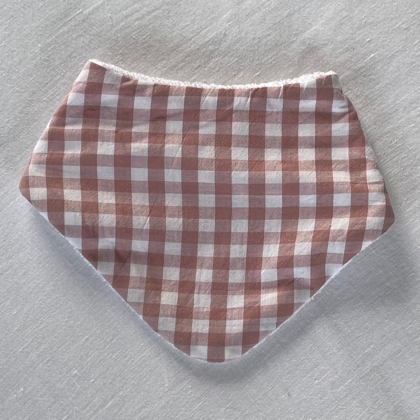 Gingham dribble bib pink and white squares
