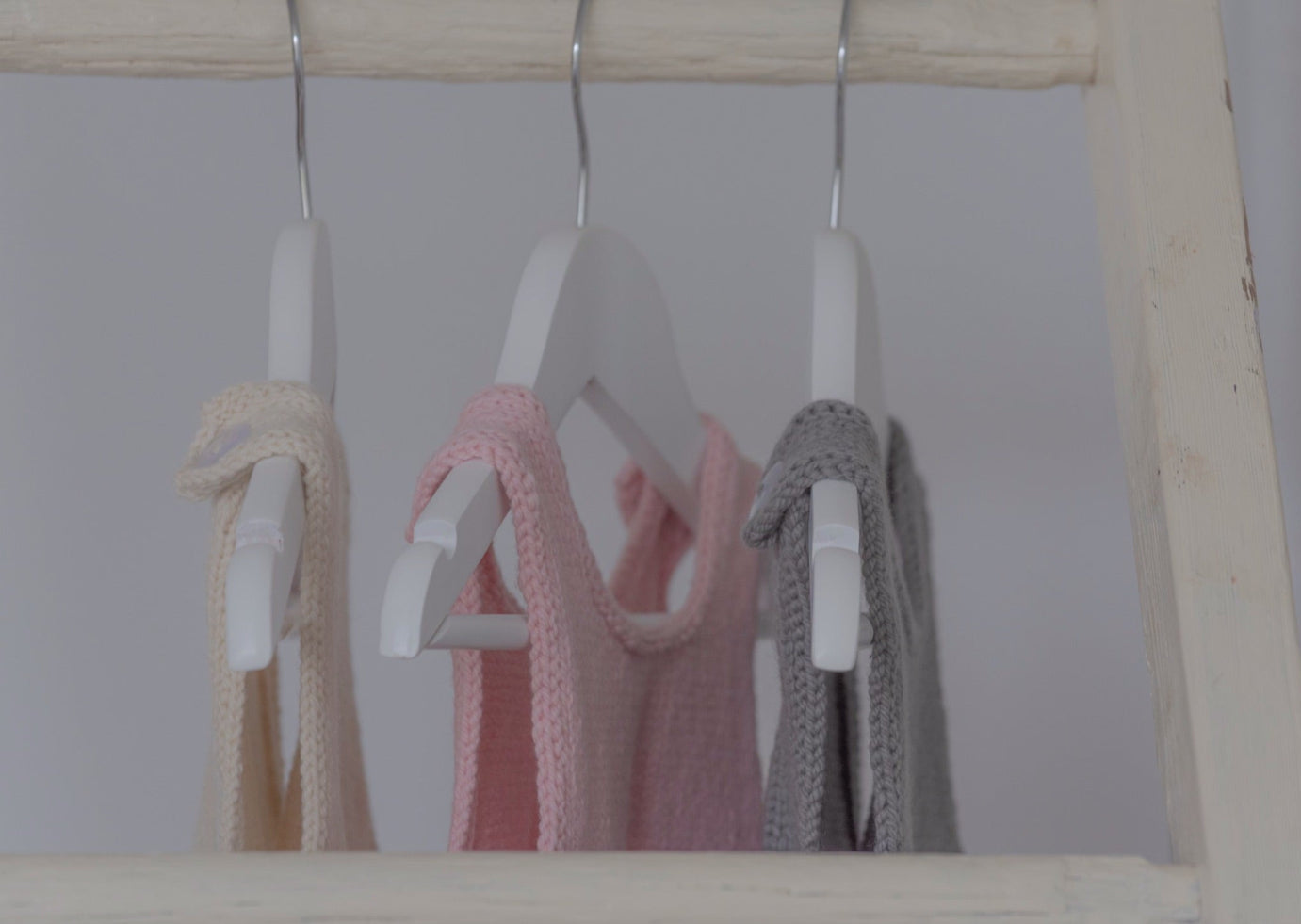 Hangers of coloured Weebits dungarees