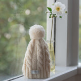 Natural cable knit baby hat