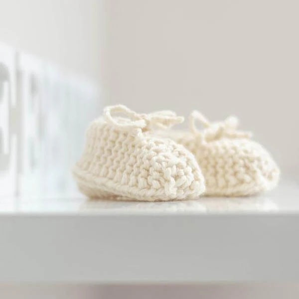 Natural premature chunky booties on shelf