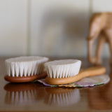 Newborn hairbrush in beechwood or pearwood on dresser