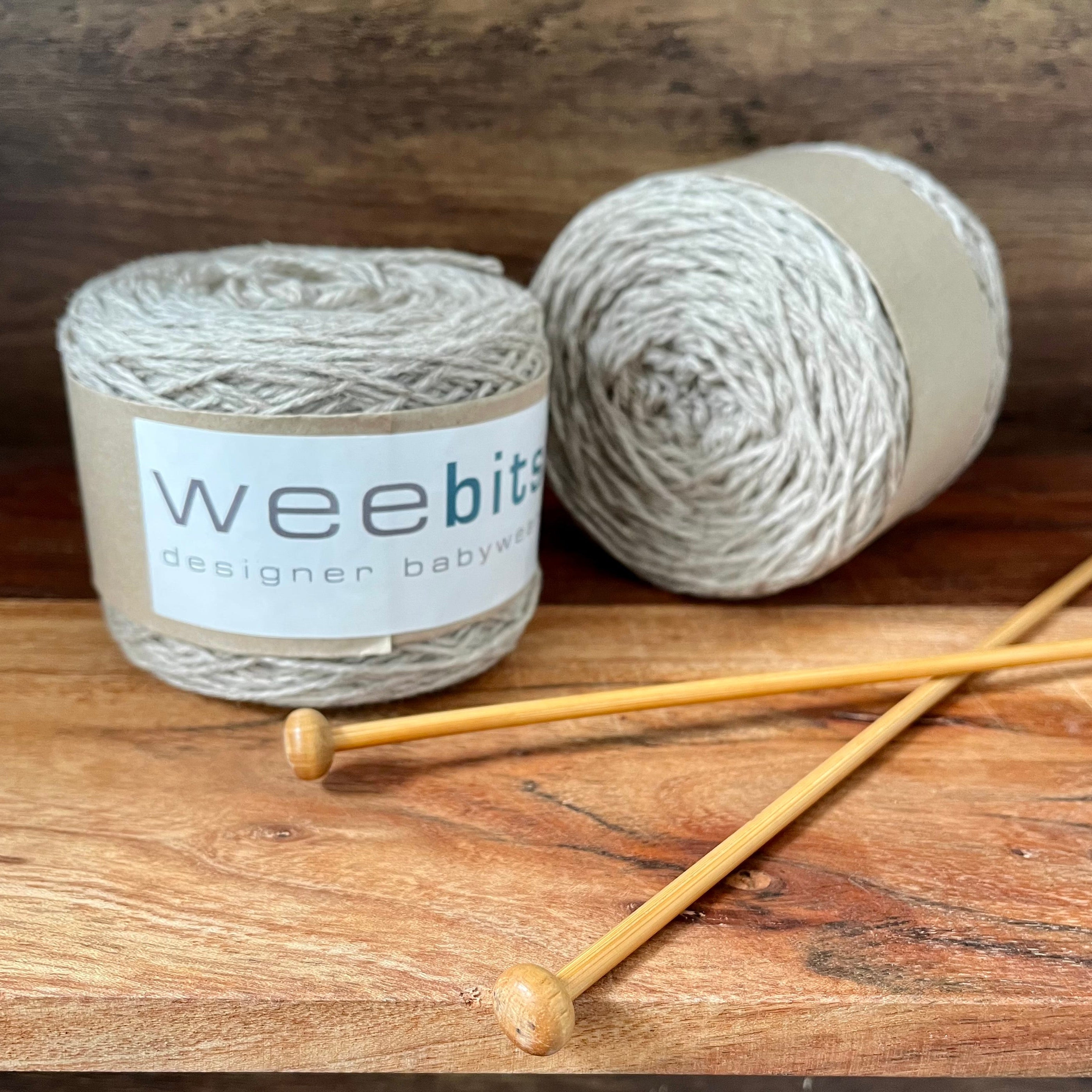 Oatmeal marle merino yarn 100g balls on shelf