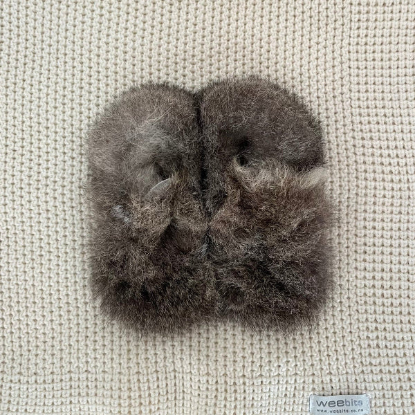 possum booties in natural colouring