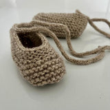 SIde view of little swan slippers