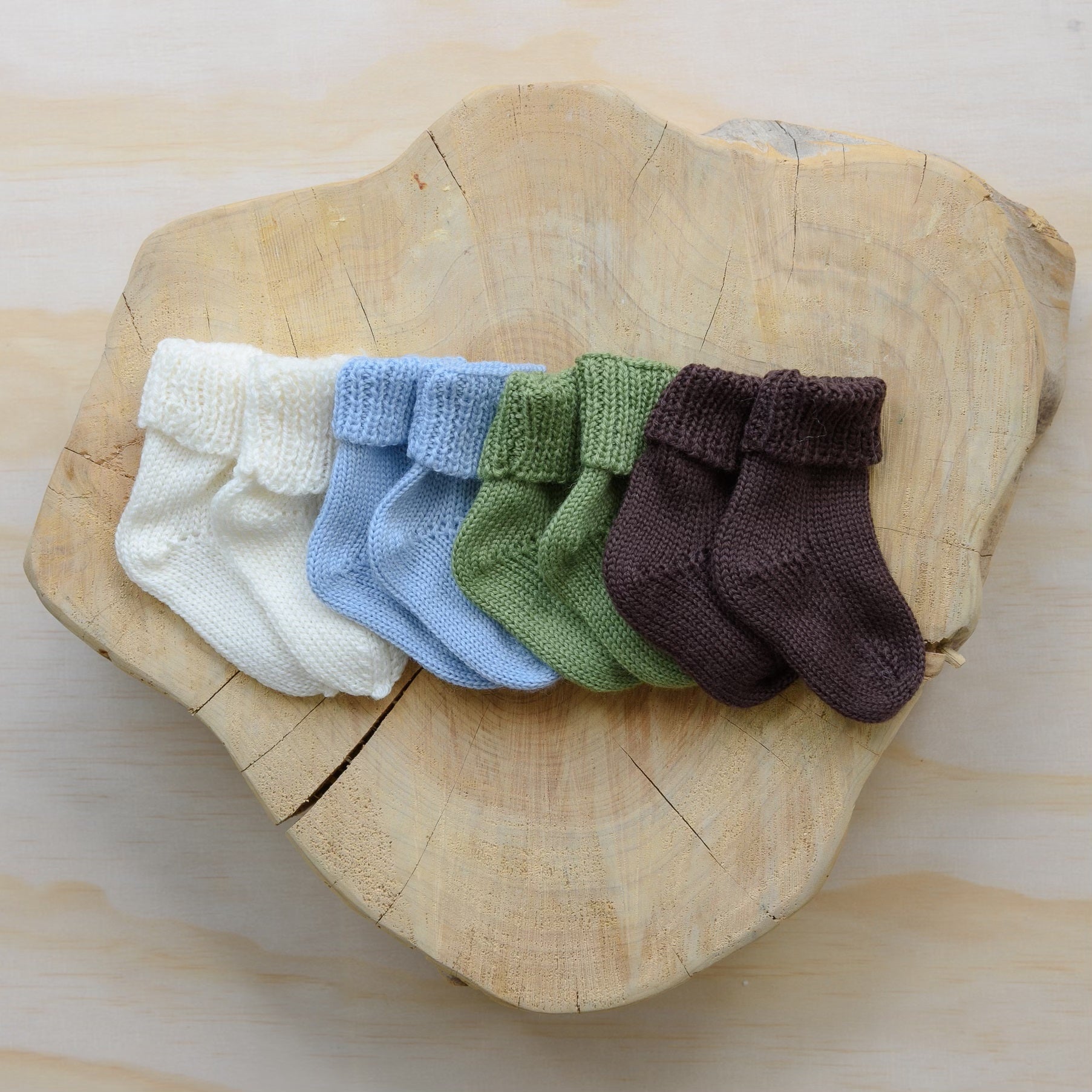 Stack of merino baby socks