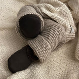 underside-of-chocolate-lambskin-booties