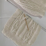 Baby Aran sweater being knitted