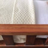 baby bassinet with butter milk knitted baby wraps