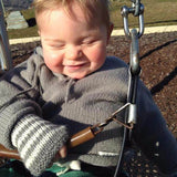 Baby in fingerless mittens