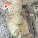 baby wearing premature knitted pants
