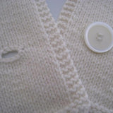 Button detail of baby scarf