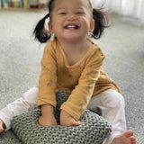 Girl with mushroom nursery cushion