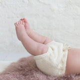 Infant in natural over nappy pants