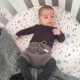 Newborn in mushroom over nappy pants