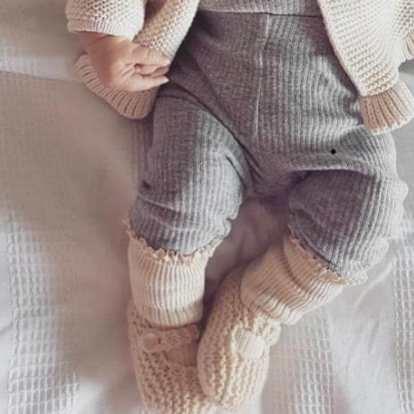 Newborn in natural knitted Mary Janes