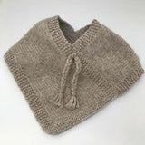 Oatmeal baby poncho