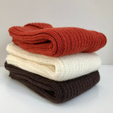 orange ivory and brown baby singlets