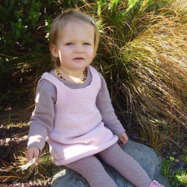 Pink knitted baby dress