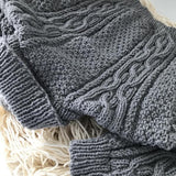 Shoulder detail of mushroom baby Aran sweater