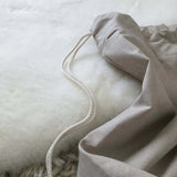 sleep Sheepskin baby rug with drawstring bag