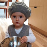 Toddler wearing mushroom baby beret hat