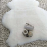 White sleep sheepskin baby rug