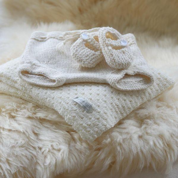 selection of merino blankets, wraps and soft sheepskin rugs