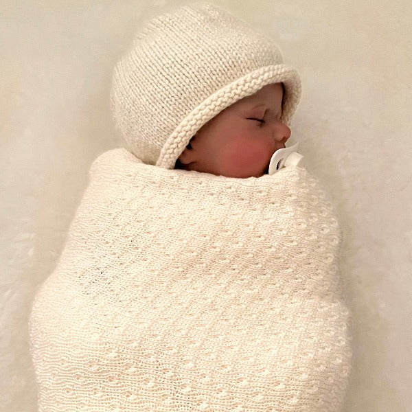 Baby asleep in merino wool wrap