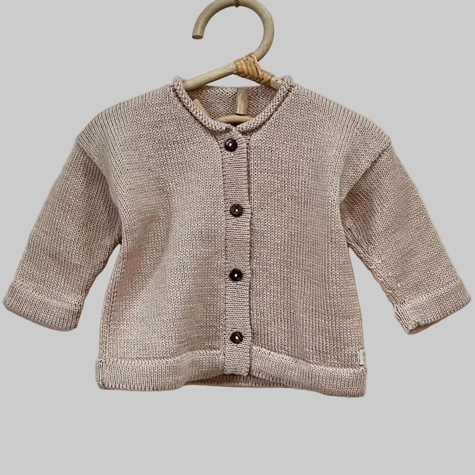 Sandstone baby marley cardigan on hanger