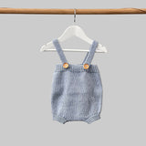 Baby romper in blue on hanger