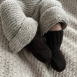 Baby wearing chocolate double knit socks