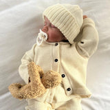 Baby wearing Ivory Marley Cardigan