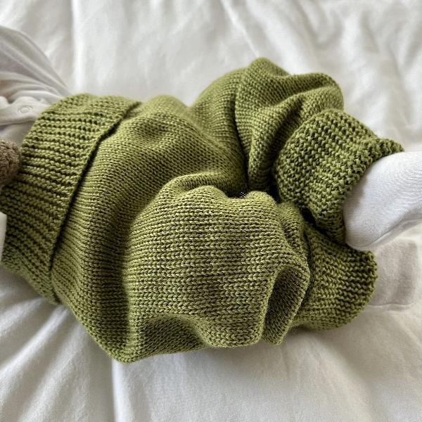 Baby wearing moss merino jolly jodhpurs