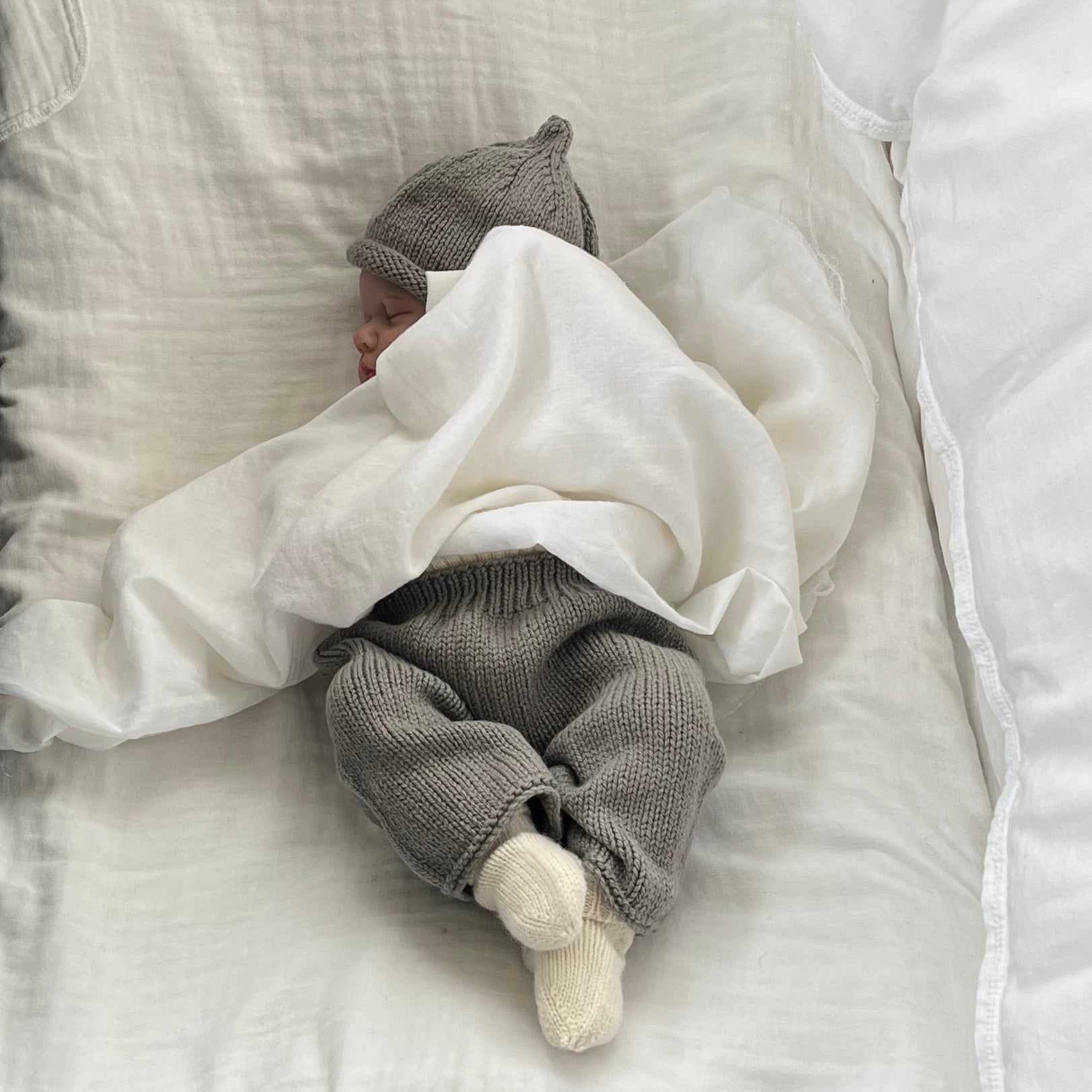 Baby wearing mushroom premature pants