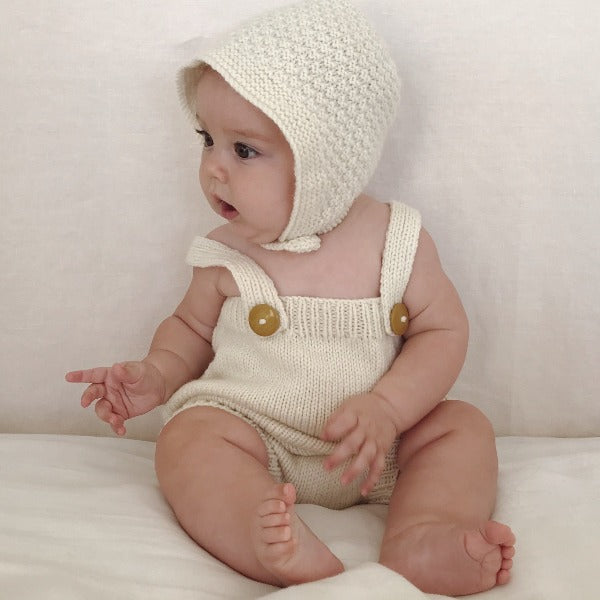 Baby wearing natural Romper