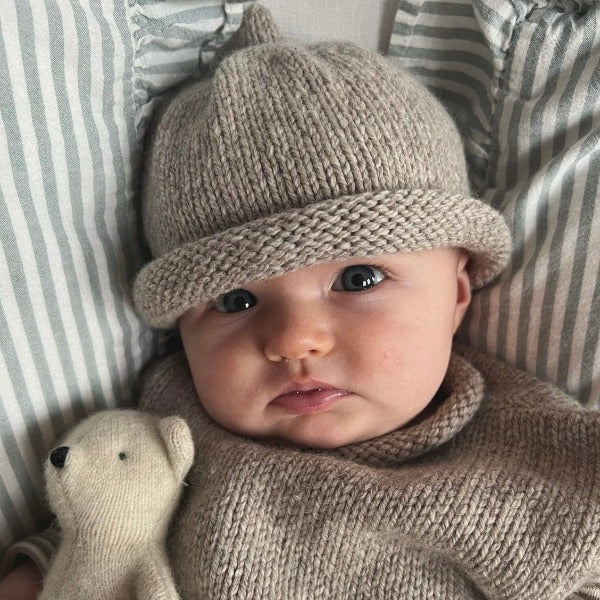 Baby wearing Oatmeal Marle beanie