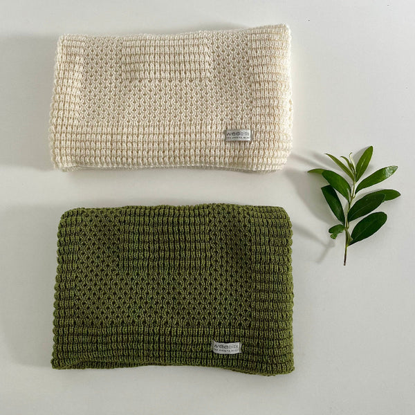 Butter milk and moss pram blanket