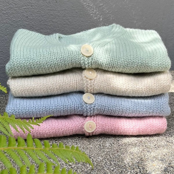 Cardigan stack of pastel colours